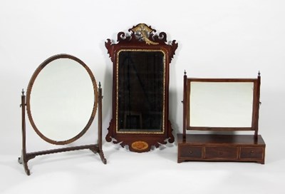 Lot 719 - A George III style mahogany fret carved mirror...