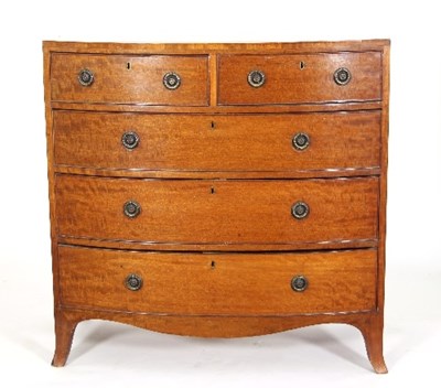 Lot 731 - A 19th Century satinwood bowfront chest of two...