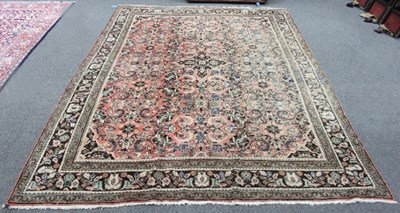 Lot 751 - A Mahal carpet, the madder field with an...