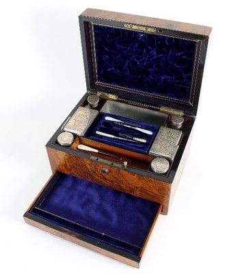 Lot 773 - A Victorian walnut travelling dressing case by...