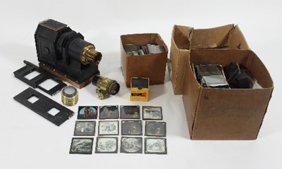 Lot 822 - A magic lantern and a quantity of magic...