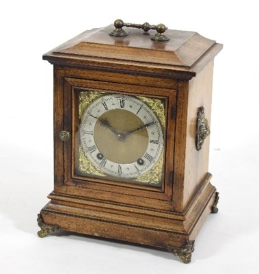 Lot 825 - An Edwardian mantel clock in a rosewood case...