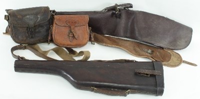 Lot 853 - A leg o' mutton type gun case, two leather...