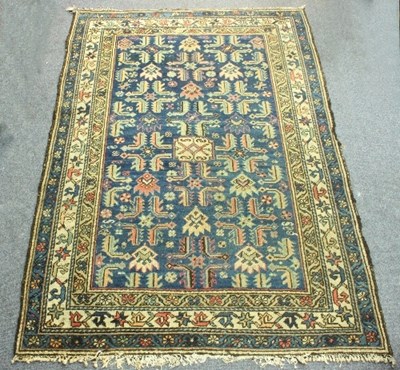 Lot 1 - A Hamadan rug with medallions and stylised...