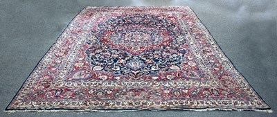 Lot 5 - A large Kashan carpet, the central medallion...