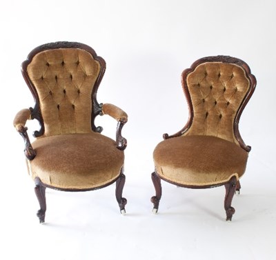 Lot 13 - A pair of Victorian walnut framed fireside...