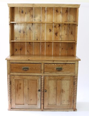 Lot 27 - A 19th Century style pine dresser, the top...