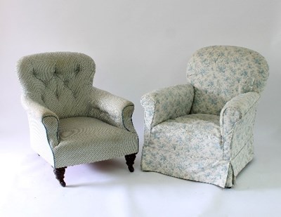 Lot 31 - A button back armchair on turned legs with...