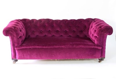 Lot 34 - A two-seater button back Chesterfield sofa...