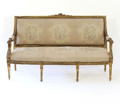 Lot 38 - A Louis XVI style gilt framed settee, the...