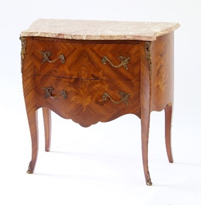 Lot 43 - A Louis XVI style commode, the serpentine...