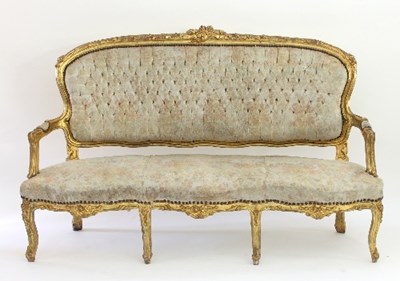 Lot 45 - A Louis XV style gilt framed salon settee, the...