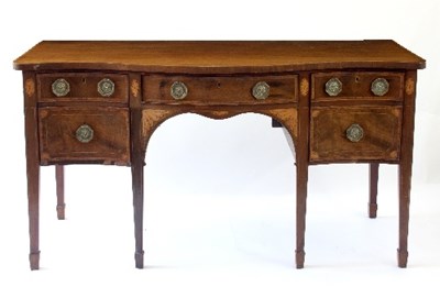 Lot 76 - A late George III serpentine front sideboard,...