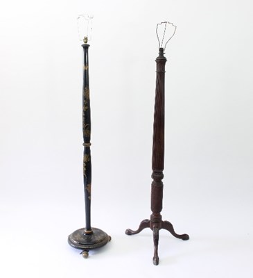 Lot 80 - A turned wood standard lamp on a tripod...