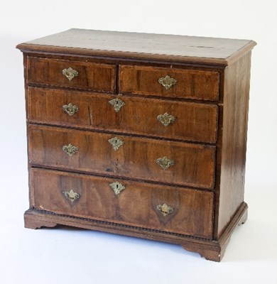 Lot 83 - An early 18th Century walnut chest fitted...