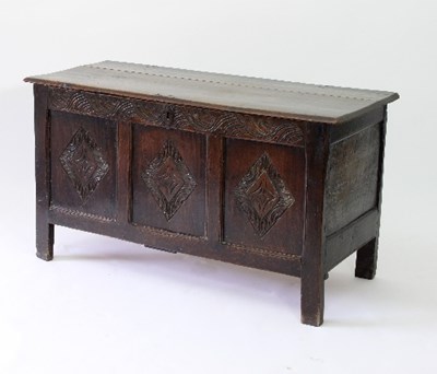 Lot 86 - A late 17th Century oak chest with plain three-...