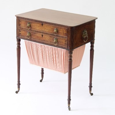 Lot 94 - A late Regency mahogany sewing table with...