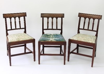 Lot 103 - Three Regency mahogany single chairs, fitted...