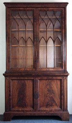 Lot 125 - A Regency mahogany bookcase, the glazed upper...