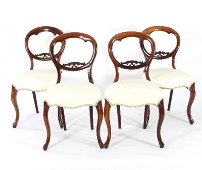 Lot 128 - A set of four Victorian mahogany salon chairs...