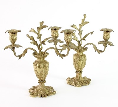 Lot 146 - A pair of rococo style candelabra, late 19th...