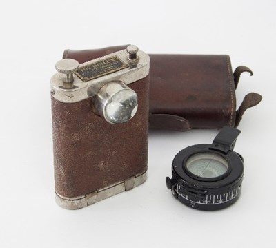 Lot 161 - A WWI torch The Orilux, JH Steward Ltd.,...