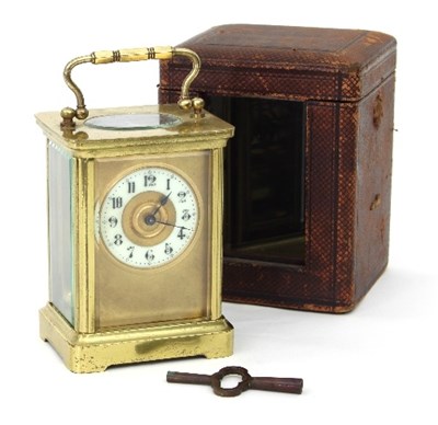 Lot 187 - A gilt brass cased carriage clock, the chapter...