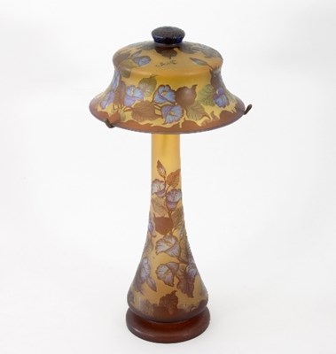 Lot 195 - A Galle© style glass lamp, the bell shaped...