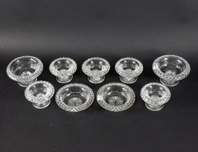 Lot 199 - Five cut glass pedestal salts, 10cm diameter,...