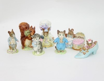 Lot 207 - A group of seven Beatrix Potter figurines,...