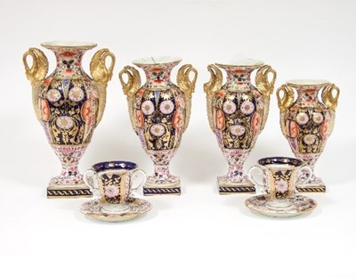 Lot 218 - A garniture of four Derby baluster vases with...