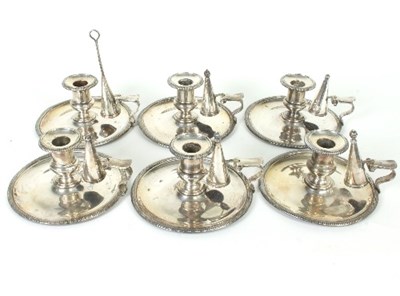 Lot 304 - A set of six Sheffield plated chamber...