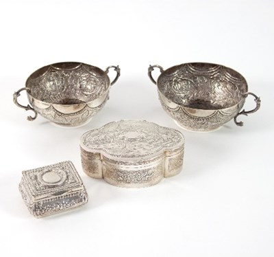 Lot 311 - A white metal trinket box of quatrefoil shape,...