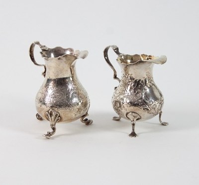 Lot 342 - A George II silver pear-shaped cream jug,...