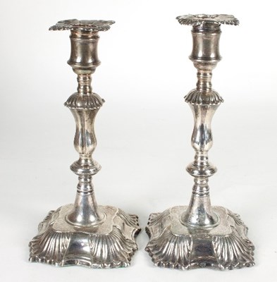 Lot 366 - A pair of George III silver candlesticks,...