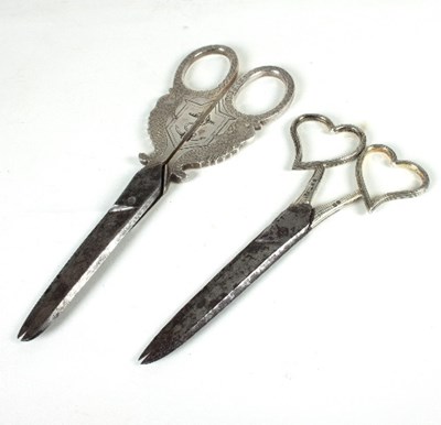 Lot 370 - A pair of 'Naval' scissors, unhallmarked, the...