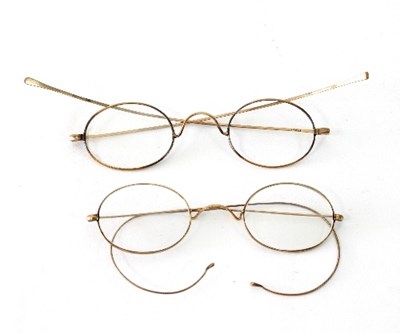 Lot 392 - Two pairs of gold rimmed spectacles