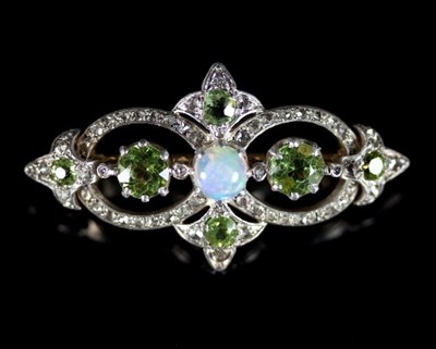 Lot 455 - An Edwardian opal, peridot and diamond brooch,...