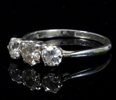 Lot 466 - A three-stone diamond ring set on a platinum...