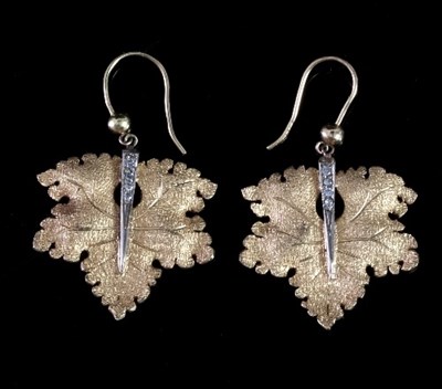 Lot 470 - A pair of ear pendants of vine leaf form, each...