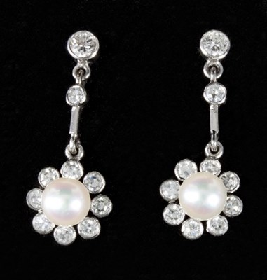 Lot 472 - A pair of diamond and pearl ear pendants, each...