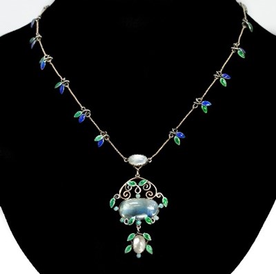 Lot 479 - An Arts and Crafts style moonstone and enamel...