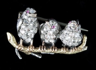 Lot 483 - A diamond brooch modelled as a bird and her...