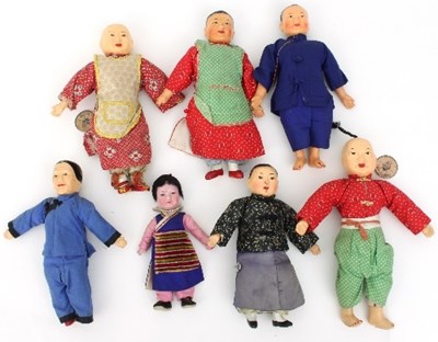 Lot 540 - Seven Oriental dolls various, some with...