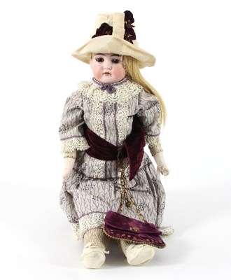 Lot 543 - A German bisque head doll, unmarked, open...