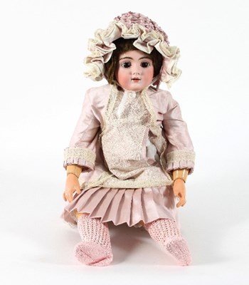 Lot 550 - A late 19th Century German bisque head doll,...