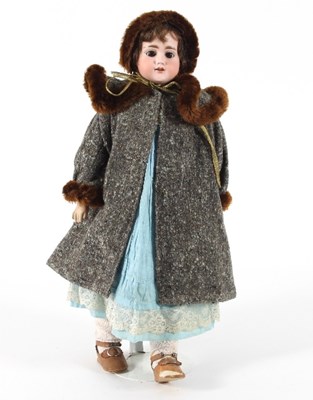 Lot 551 - An early 20th Century German bisque head doll,...