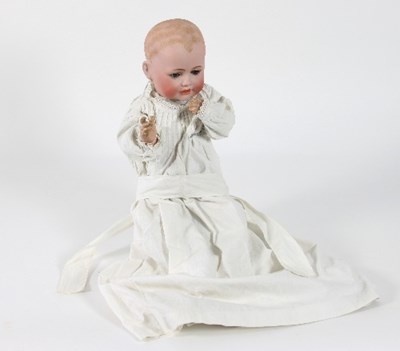 Lot 556 - A Kestner bisque head boy doll, stamped 'JBK',...