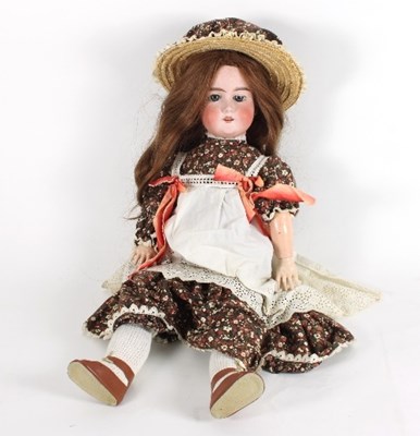 Lot 572 - A German bisque head doll, with weighted eyes,...