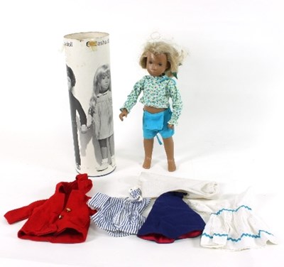 Lot 579 - A Sasha doll with long blonde hair, dressed in...